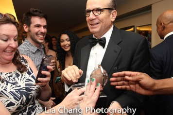 MTC's Barry Grove let everyone at the party touch the Tony for good luck. Photo by Lia Chang