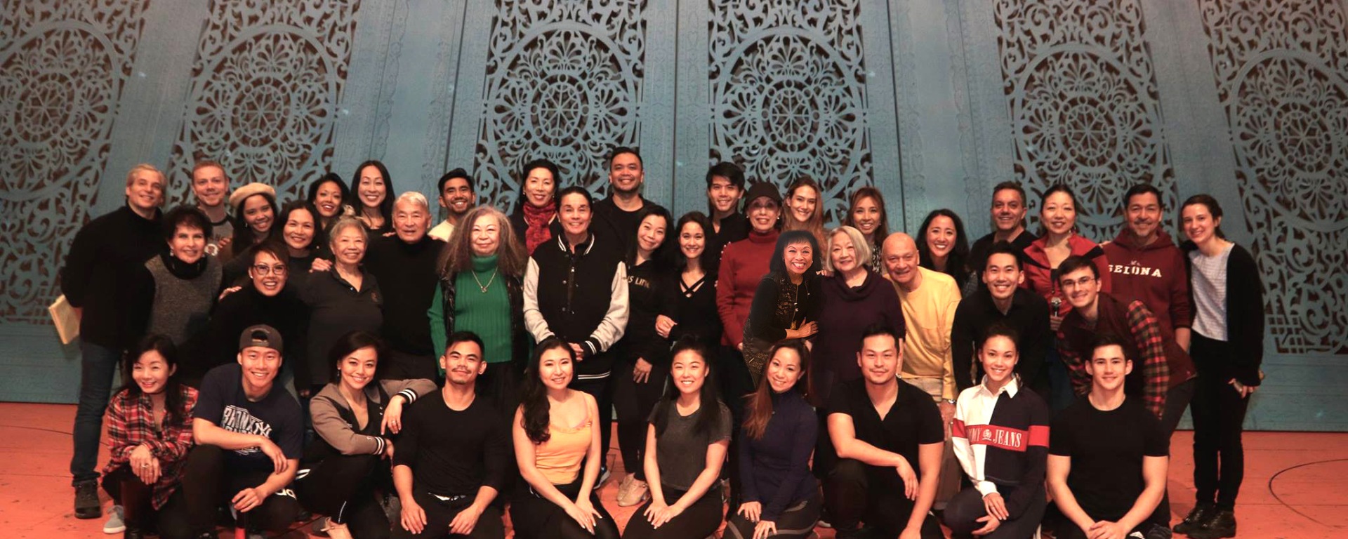 The company on the stage of The New Amsterdam Theatre in New York. Photo by Lia Chang