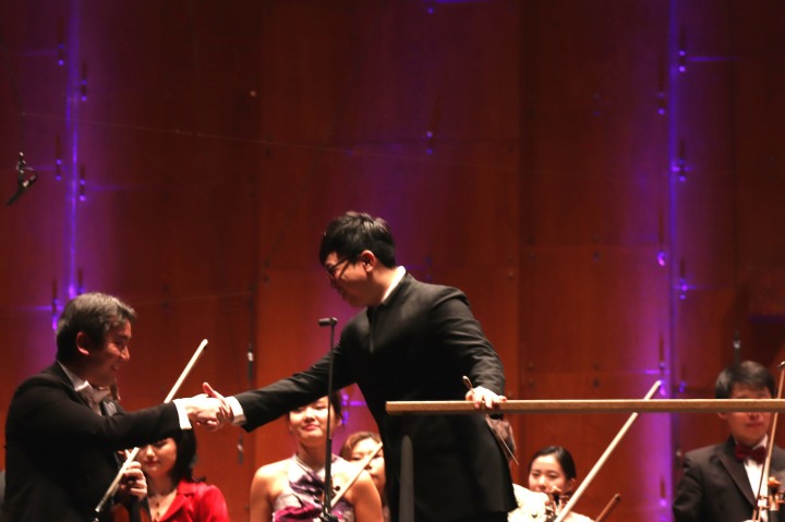 Frank Huang, New York Philharmonic concertmaster and Singaporean conductor Kahchun Wong. Photo by Lia Chang
