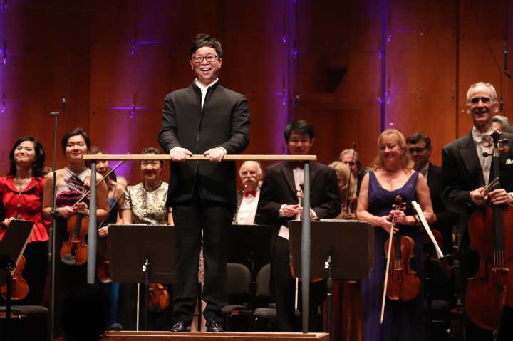 Singaporean conductor Kahchun Wong and the New York Philharmonic musicians. Photo by Lia Chang
