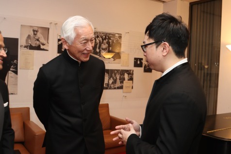 Gala Co-Chair Oscar Tang chats with Singaporean conductor Kahchun Wong in the Green room. Photo by Lia Chang